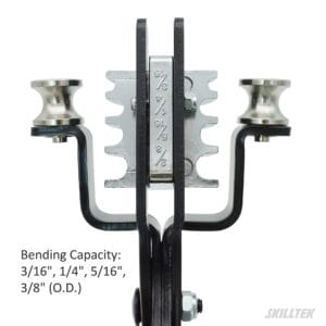 A close-up of the 4-in-1 grooved sliding block (3/16" to 3/8") showing how the pipe is securely cradled within the specific channel to maintain its structural integrity during the bend. | SKILLTEK